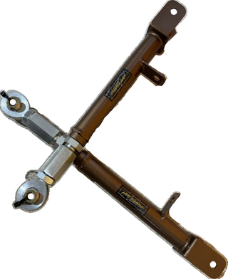 A heavy-duty metal mechanical linkage or suspension component with two brown cylindrical rods, silver ball joints, and mounting brackets, shown on a plain white background.