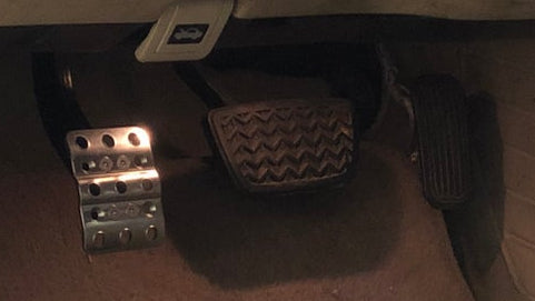 Bolt-in clutch pedal installed in a 1998-2005 Lexus GS driver footwell